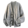 Avslappnad V-ringad cardigan